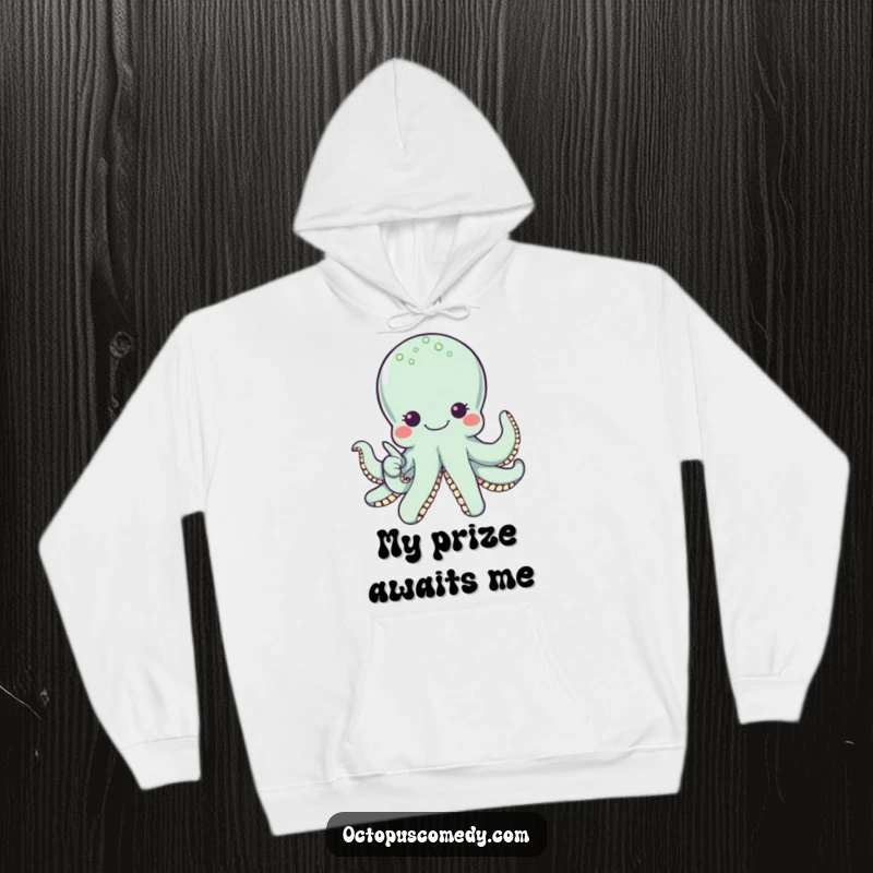 Funny octopus with wide eyes and a smile pointing to a pearl, comfortable hoodie for cozy and humorous wear.