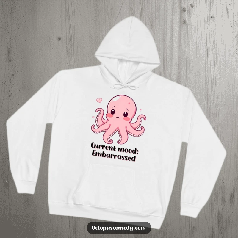 Funny hoodie featuring a surprised octopus blushing while in a current, offering cozy humor and a wonderfully funny gift.