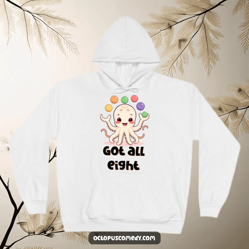 Funny Hoodie: A smiling octopus juggles eight colorful balls, offering cozy comfort and a dose of humorous, playful energy.