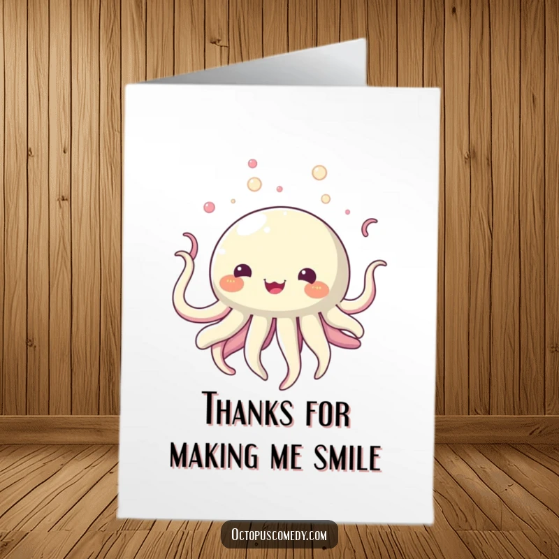 Funny Free Printable Thank You Card: a round, bubbly creature happily drifts upwards, expressing thanks with flowing tentacles.