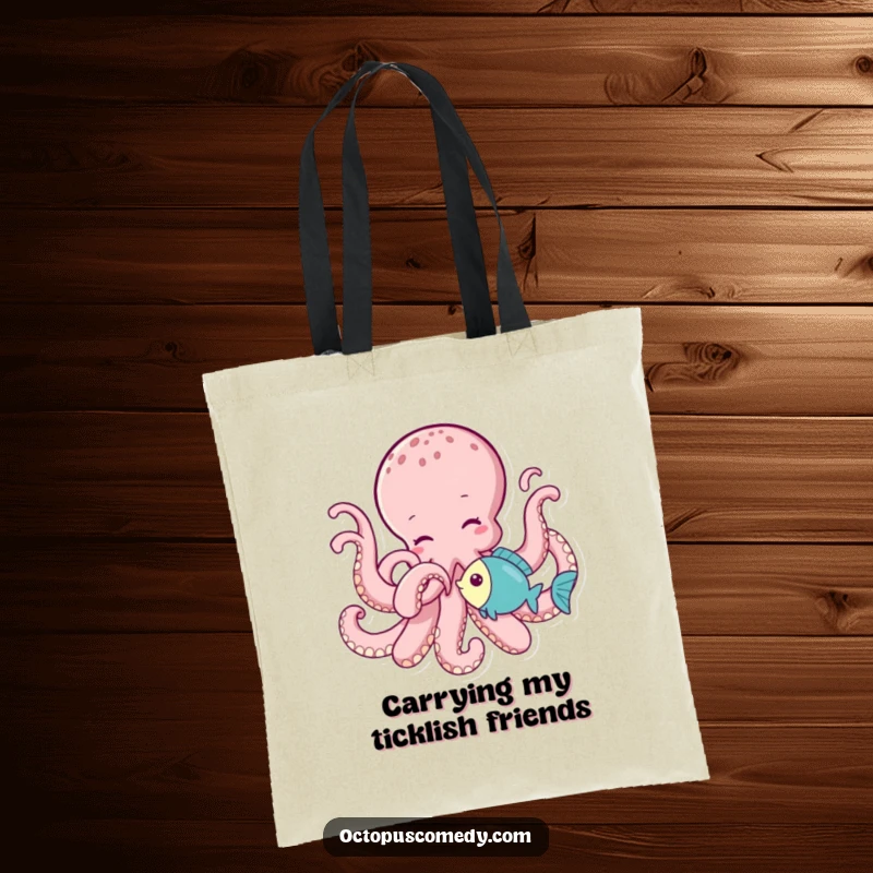 Funny octopus playfully tickling a little fish with a tentacle, featured on a reusable and humorous tote bag.
