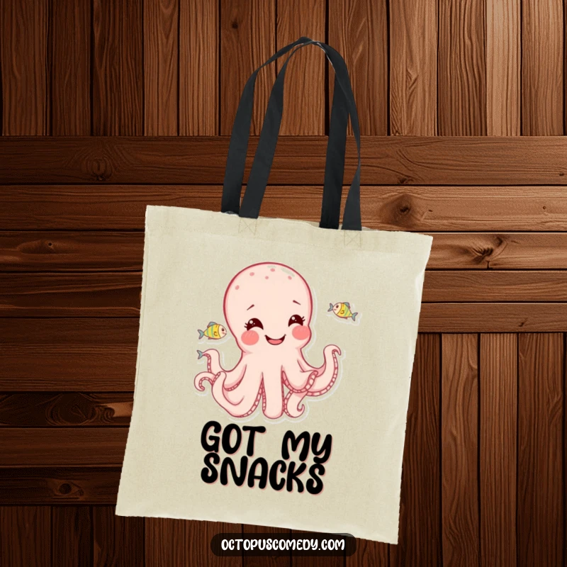 Funny octopus with a cheerful expression playfully chasing tiny fish, on a durable and stylish tote bag.